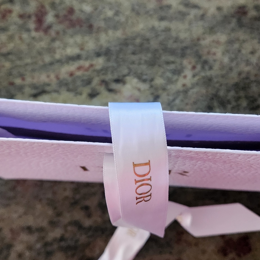 Christian Dior white pebble textured gift bag with ribbon